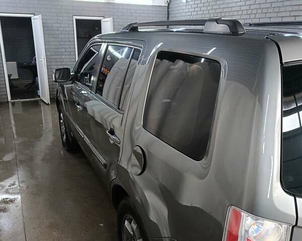 Сірий Хонда Пілот, об'ємом двигуна 3.5 л та пробігом 239 тис. км за 13000 $, фото 3 на Automoto.ua