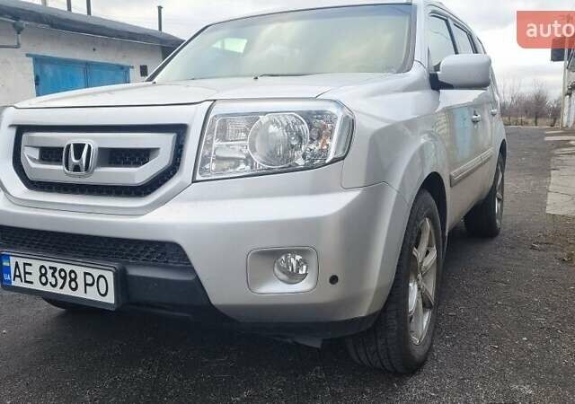 Серый Хонда Пилот, объемом двигателя 3.5 л и пробегом 250 тыс. км за 12000 $, фото 3 на Automoto.ua