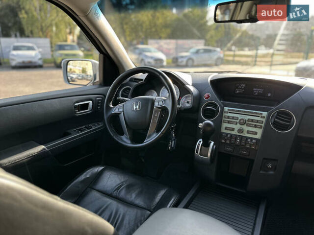 Сірий Хонда Пілот, об'ємом двигуна 3.47 л та пробігом 225 тис. км за 12700 $, фото 31 на Automoto.ua