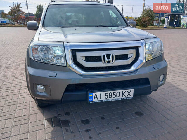 Серый Хонда Пилот, объемом двигателя 3.5 л и пробегом 200 тыс. км за 11000 $, фото 1 на Automoto.ua