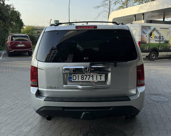 Сірий Хонда Пілот, об'ємом двигуна 3.47 л та пробігом 309 тис. км за 10500 $, фото 4 на Automoto.ua