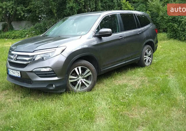 Серый Хонда Пилот, объемом двигателя 3.47 л и пробегом 79 тыс. км за 15200 $, фото 1 на Automoto.ua