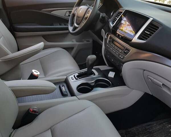 Серый Хонда Пилот, объемом двигателя 3.47 л и пробегом 90 тыс. км за 19300 $, фото 4 на Automoto.ua