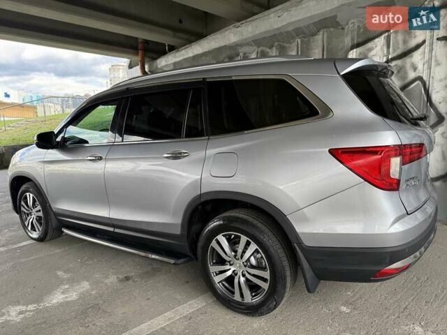 Серый Хонда Пилот, объемом двигателя 3 л и пробегом 125 тыс. км за 23000 $, фото 7 на Automoto.ua