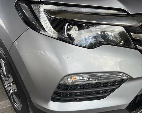 Серый Хонда Пилот, объемом двигателя 3 л и пробегом 125 тыс. км за 23000 $, фото 14 на Automoto.ua