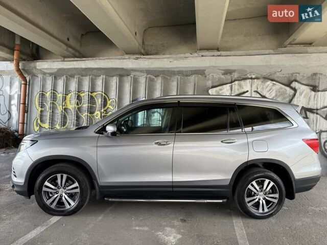 Серый Хонда Пилот, объемом двигателя 3 л и пробегом 125 тыс. км за 23000 $, фото 3 на Automoto.ua