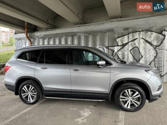 Серый Хонда Пилот, объемом двигателя 3 л и пробегом 125 тыс. км за 23000 $, фото 10 на Automoto.ua