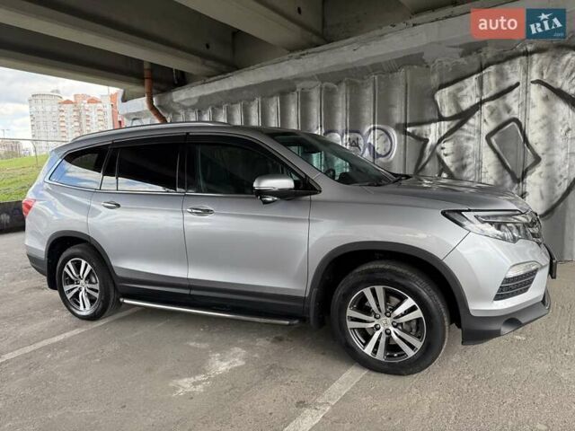 Серый Хонда Пилот, объемом двигателя 3 л и пробегом 125 тыс. км за 23000 $, фото 13 на Automoto.ua