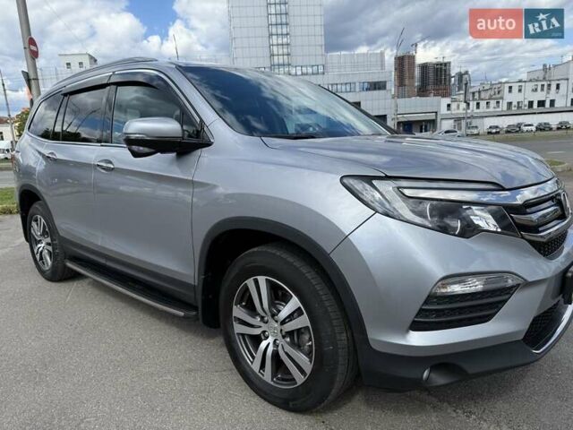 Серый Хонда Пилот, объемом двигателя 3 л и пробегом 125 тыс. км за 23500 $, фото 17 на Automoto.ua