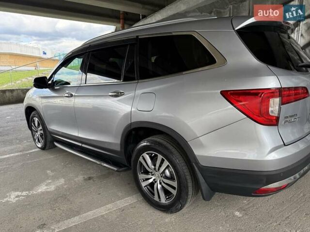 Серый Хонда Пилот, объемом двигателя 3 л и пробегом 125 тыс. км за 23000 $, фото 6 на Automoto.ua