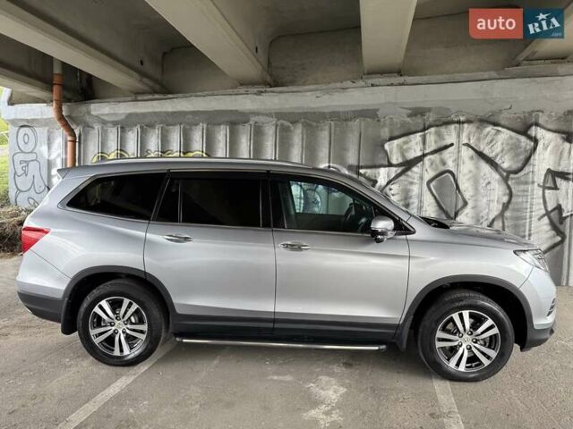 Серый Хонда Пилот, объемом двигателя 3 л и пробегом 125 тыс. км за 23000 $, фото 11 на Automoto.ua