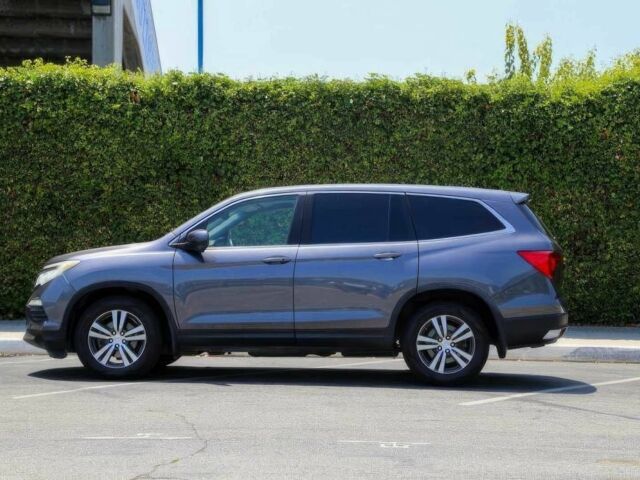 Серый Хонда Пилот, объемом двигателя 3.5 л и пробегом 68 тыс. км за 18500 $, фото 4 на Automoto.ua