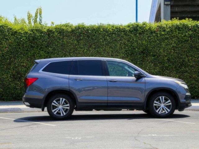 Серый Хонда Пилот, объемом двигателя 3.5 л и пробегом 68 тыс. км за 18500 $, фото 3 на Automoto.ua