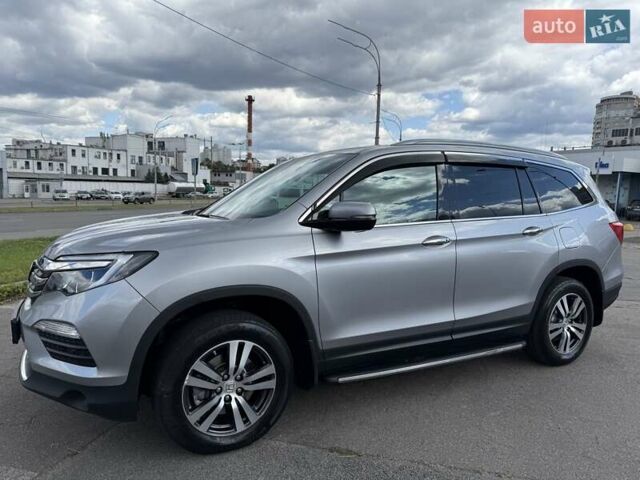 Серый Хонда Пилот, объемом двигателя 3 л и пробегом 125 тыс. км за 23500 $, фото 4 на Automoto.ua