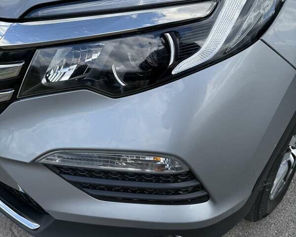 Серый Хонда Пилот, объемом двигателя 3 л и пробегом 125 тыс. км за 23500 $, фото 18 на Automoto.ua