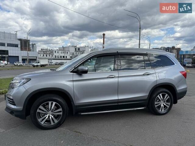 Серый Хонда Пилот, объемом двигателя 3 л и пробегом 125 тыс. км за 23500 $, фото 5 на Automoto.ua