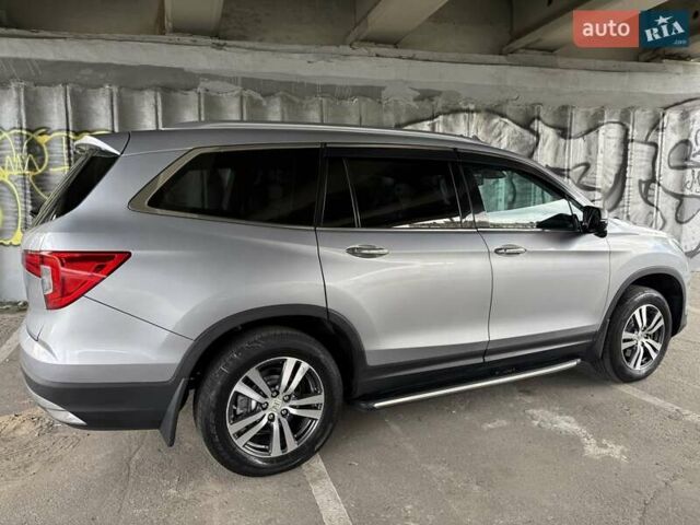 Серый Хонда Пилот, объемом двигателя 3 л и пробегом 125 тыс. км за 23000 $, фото 12 на Automoto.ua