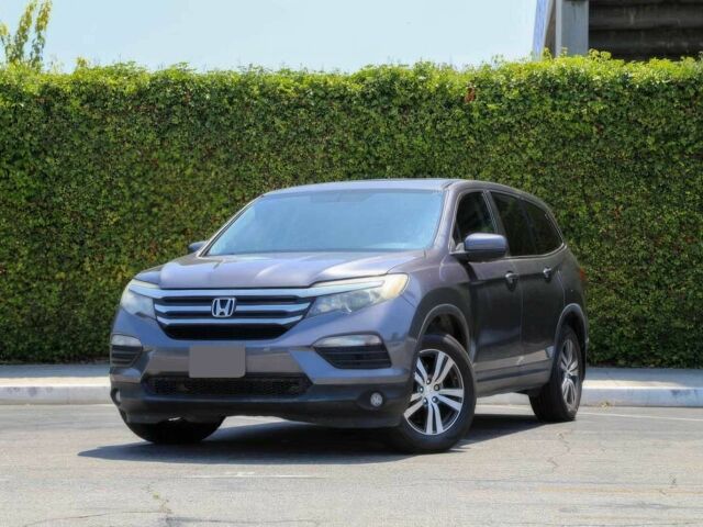 Серый Хонда Пилот, объемом двигателя 3.5 л и пробегом 68 тыс. км за 18500 $, фото 2 на Automoto.ua