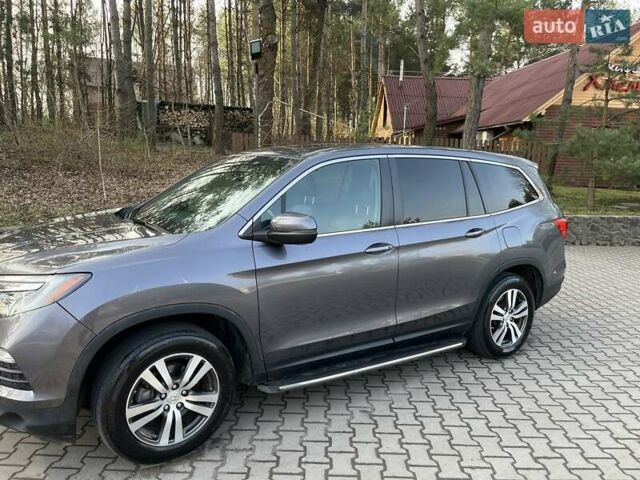 Серый Хонда Пилот, объемом двигателя 3.47 л и пробегом 184 тыс. км за 18500 $, фото 2 на Automoto.ua