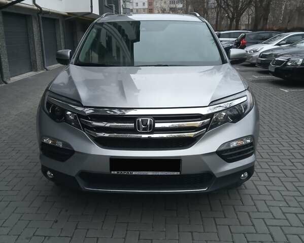 Серый Хонда Пилот, объемом двигателя 3.47 л и пробегом 98 тыс. км за 24000 $, фото 2 на Automoto.ua