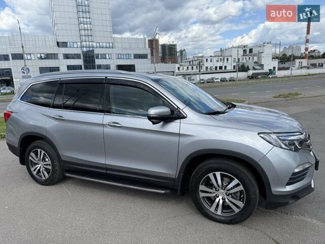 Серый Хонда Пилот, объемом двигателя 3 л и пробегом 125 тыс. км за 23500 $, фото 16 на Automoto.ua