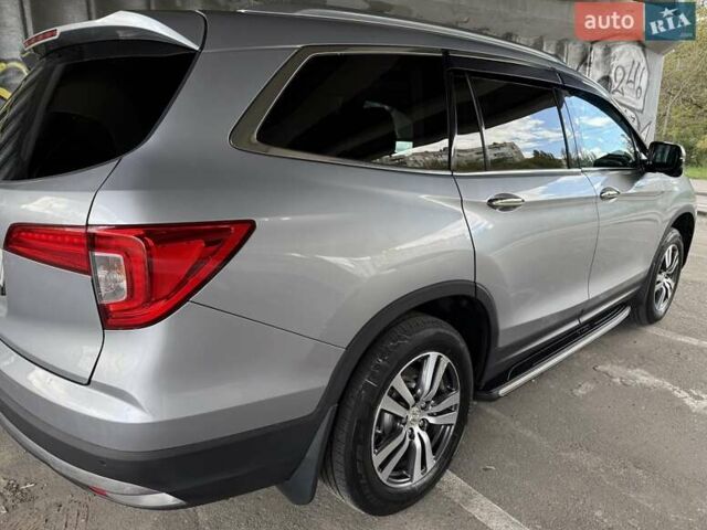 Серый Хонда Пилот, объемом двигателя 3 л и пробегом 125 тыс. км за 23000 $, фото 8 на Automoto.ua