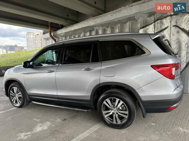 Серый Хонда Пилот, объемом двигателя 3 л и пробегом 125 тыс. км за 23000 $, фото 5 на Automoto.ua