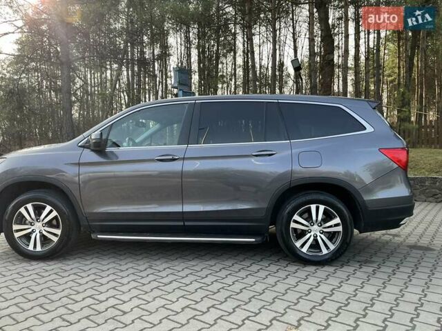 Серый Хонда Пилот, объемом двигателя 3.47 л и пробегом 184 тыс. км за 19500 $, фото 3 на Automoto.ua