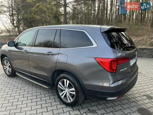 Серый Хонда Пилот, объемом двигателя 3.47 л и пробегом 184 тыс. км за 19500 $, фото 4 на Automoto.ua