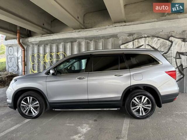 Серый Хонда Пилот, объемом двигателя 3 л и пробегом 125 тыс. км за 23000 $, фото 2 на Automoto.ua