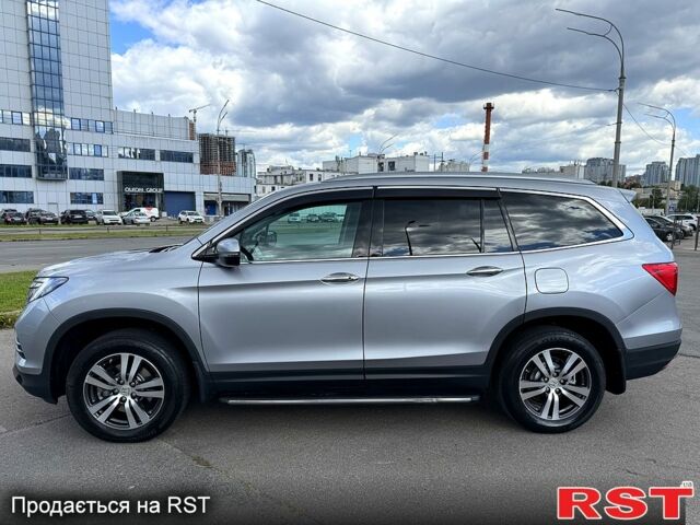 Серый Хонда Пилот, объемом двигателя 3 л и пробегом 125 тыс. км за 22800 $, фото 1 на Automoto.ua