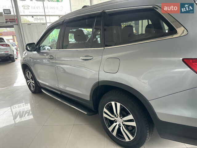 Серый Хонда Пилот, объемом двигателя 3.47 л и пробегом 77 тыс. км за 24950 $, фото 7 на Automoto.ua