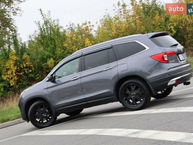 Серый Хонда Пилот, объемом двигателя 3.47 л и пробегом 81 тыс. км за 25000 $, фото 4 на Automoto.ua