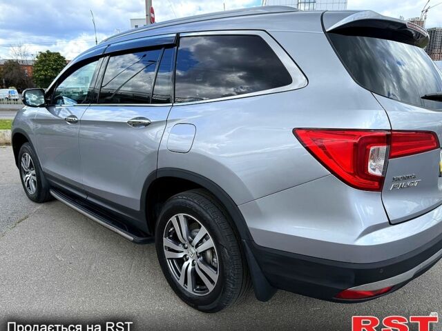 Серый Хонда Пилот, объемом двигателя 3 л и пробегом 125 тыс. км за 22800 $, фото 2 на Automoto.ua