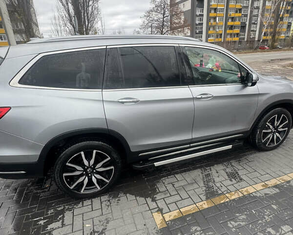 Серый Хонда Пилот, объемом двигателя 3.47 л и пробегом 135 тыс. км за 24000 $, фото 3 на Automoto.ua