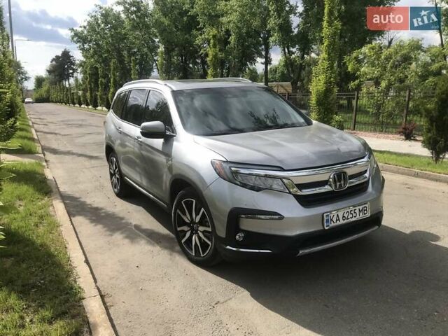 Серый Хонда Пилот, объемом двигателя 3.47 л и пробегом 91 тыс. км за 28000 $, фото 1 на Automoto.ua