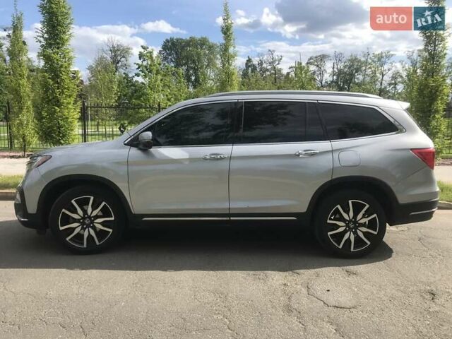 Серый Хонда Пилот, объемом двигателя 3.47 л и пробегом 91 тыс. км за 28000 $, фото 6 на Automoto.ua