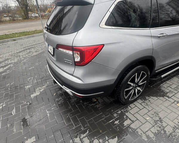 Серый Хонда Пилот, объемом двигателя 3.47 л и пробегом 135 тыс. км за 24000 $, фото 4 на Automoto.ua