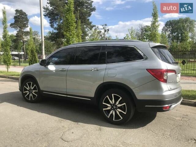 Серый Хонда Пилот, объемом двигателя 3.47 л и пробегом 91 тыс. км за 28000 $, фото 4 на Automoto.ua