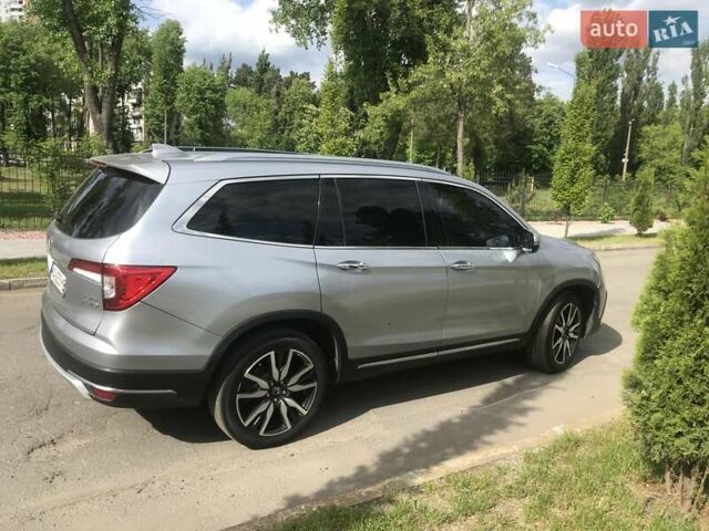 Серый Хонда Пилот, объемом двигателя 3.47 л и пробегом 91 тыс. км за 28000 $, фото 3 на Automoto.ua