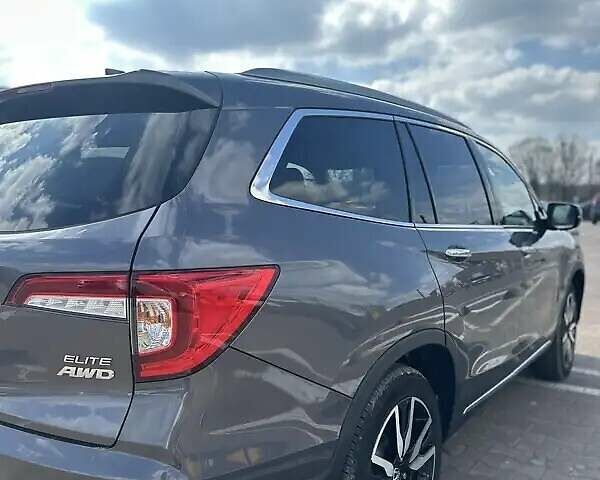 Серый Хонда Пилот, объемом двигателя 3.47 л и пробегом 21 тыс. км за 30000 $, фото 4 на Automoto.ua