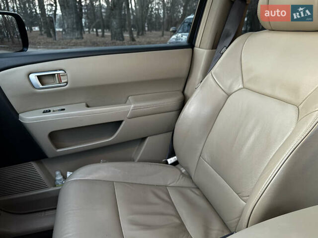 Синий Хонда Пилот, объемом двигателя 3.47 л и пробегом 190 тыс. км за 11000 $, фото 29 на Automoto.ua