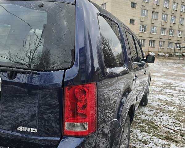 Синий Хонда Пилот, объемом двигателя 3.47 л и пробегом 144 тыс. км за 14300 $, фото 7 на Automoto.ua