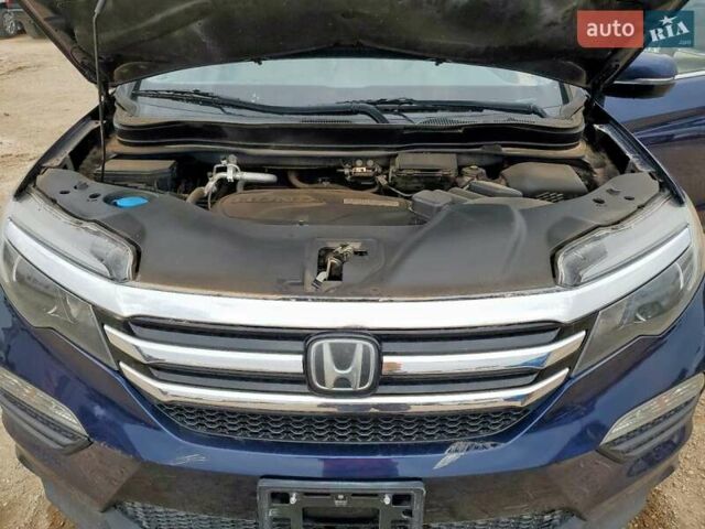 Синий Хонда Пилот, объемом двигателя 3.47 л и пробегом 144 тыс. км за 4200 $, фото 11 на Automoto.ua