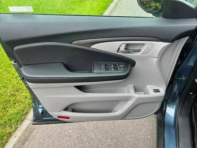 Синий Хонда Пилот, объемом двигателя 3.5 л и пробегом 56 тыс. км за 6500 $, фото 19 на Automoto.ua