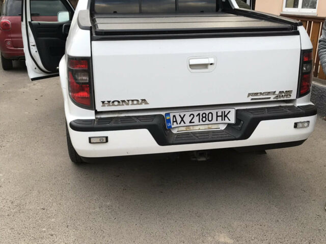 Білий Хонда Ріджлайн, об'ємом двигуна 3.47 л та пробігом 160 тис. км за 15500 $, фото 4 на Automoto.ua