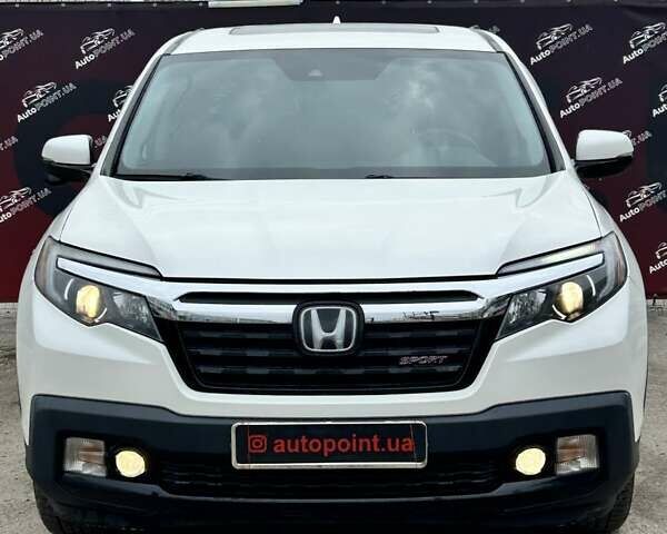 Білий Хонда Ріджлайн, об'ємом двигуна 3.47 л та пробігом 87 тис. км за 19900 $, фото 1 на Automoto.ua