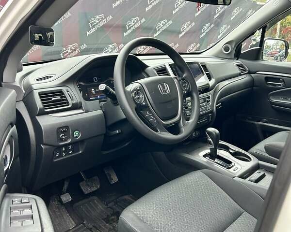 Білий Хонда Ріджлайн, об'ємом двигуна 3.47 л та пробігом 87 тис. км за 19900 $, фото 18 на Automoto.ua