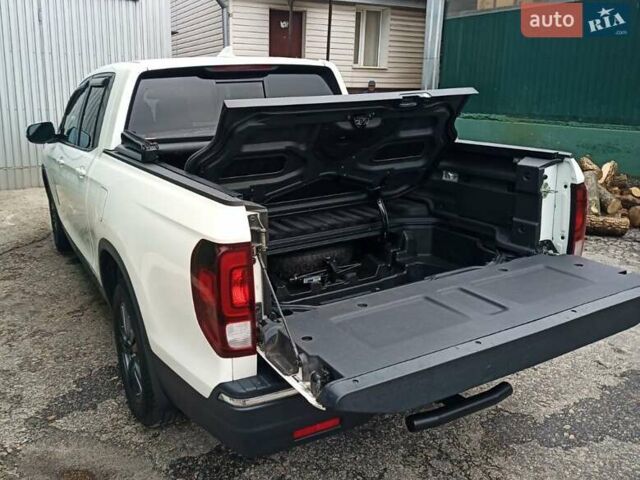 Білий Хонда Ріджлайн, об'ємом двигуна 3.5 л та пробігом 80 тис. км за 25500 $, фото 10 на Automoto.ua