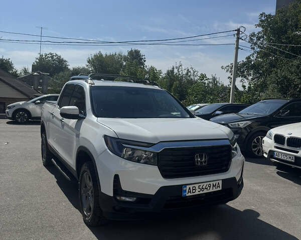 Білий Хонда Ріджлайн, об'ємом двигуна 3.47 л та пробігом 112 тис. км за 25000 $, фото 2 на Automoto.ua